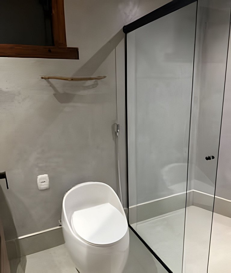Suíte queen na Rua Mucugê – Piscina e conforto em Arraial
